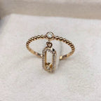 Bague Fine Or Rose - Ovale Serti, Pierre Mobile, Anneau Torsadé – or 18 carats | Tariki
