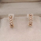 Boucles d'Oreilles Mini Créoles Cloutées Or Rose - Motif Clash – or 18 carats | Tariki