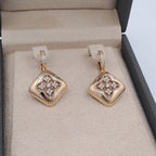 Boucles d'Oreilles Pendantes Losanges Or Rose - Sertis de Pierres – or 18 carats | Tariki