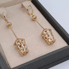Boucles d'Oreilles Pendantes Or Rose - Lanternes Ajourées et Boules – or 18 carats | Tariki