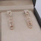 Boucles d'Oreilles Pendantes Or Rose - Ovales Sertis de Pierres – or 18 carats | Tariki
