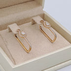 Boucles d'Oreilles Pendantes Or Rose - Ovales Sertis, Pierre Mobile – or 18 carats | Tariki