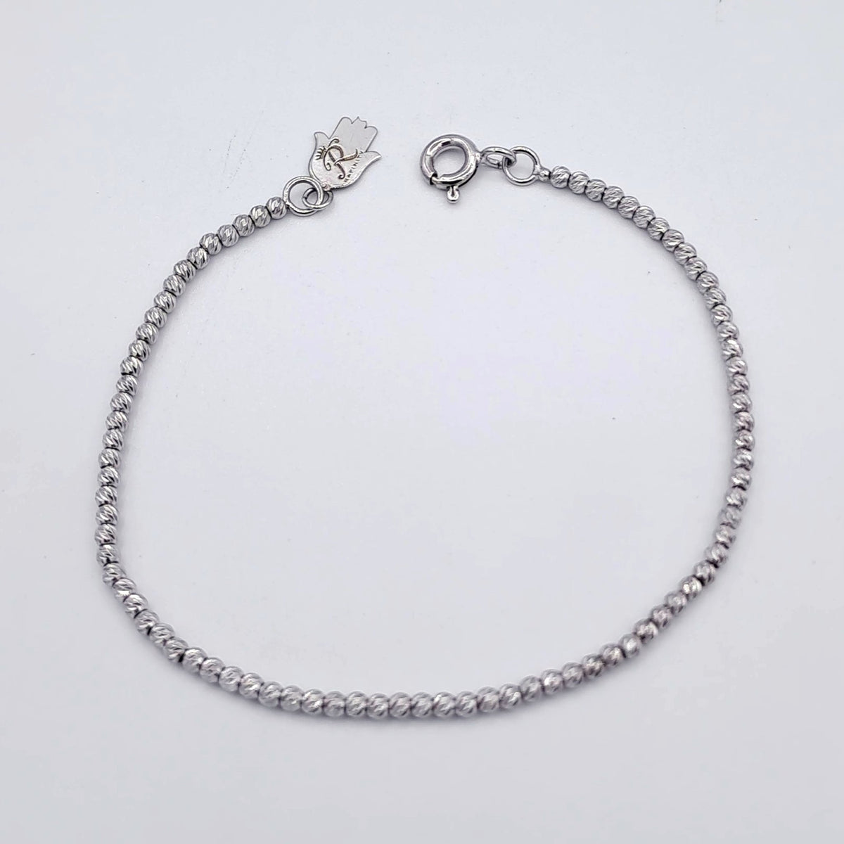Bracelet Boules Facettées Or Blanc – or 18 carats | Tariki