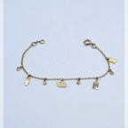 Bracelet Chaîne Or Jaune - À Breloques (main de Fatma, Cœur, Étoile) – or 18 carats | Tariki