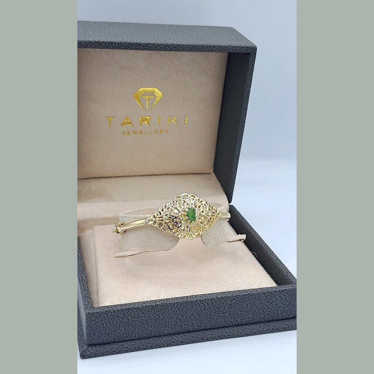 Bracelet Jonc Beldi Ajouré Losange Or Jaune - Serti de Pierres, Pierre Verte – or 18 carats | Tariki