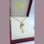 Collier Or Jaune - Pendentifs Main de Fatma, Plaque Ajourée et Boule – or 18 carats | Tariki