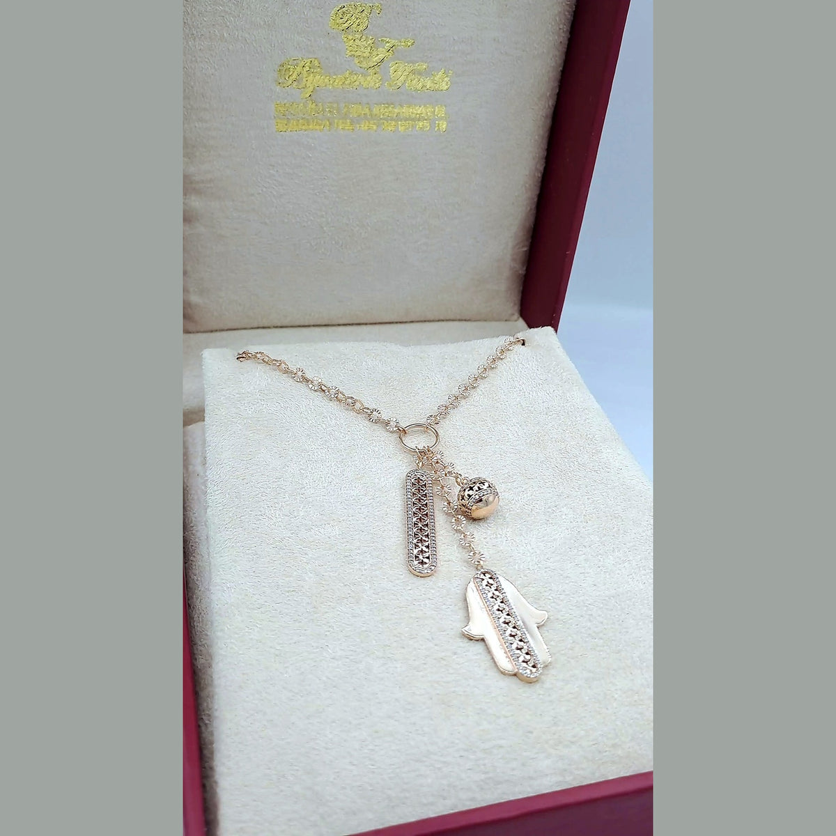 Collier Or Rose - Pendentifs Main de Fatma, Plaque Ajourée et Boule – or 18 carats | Tariki